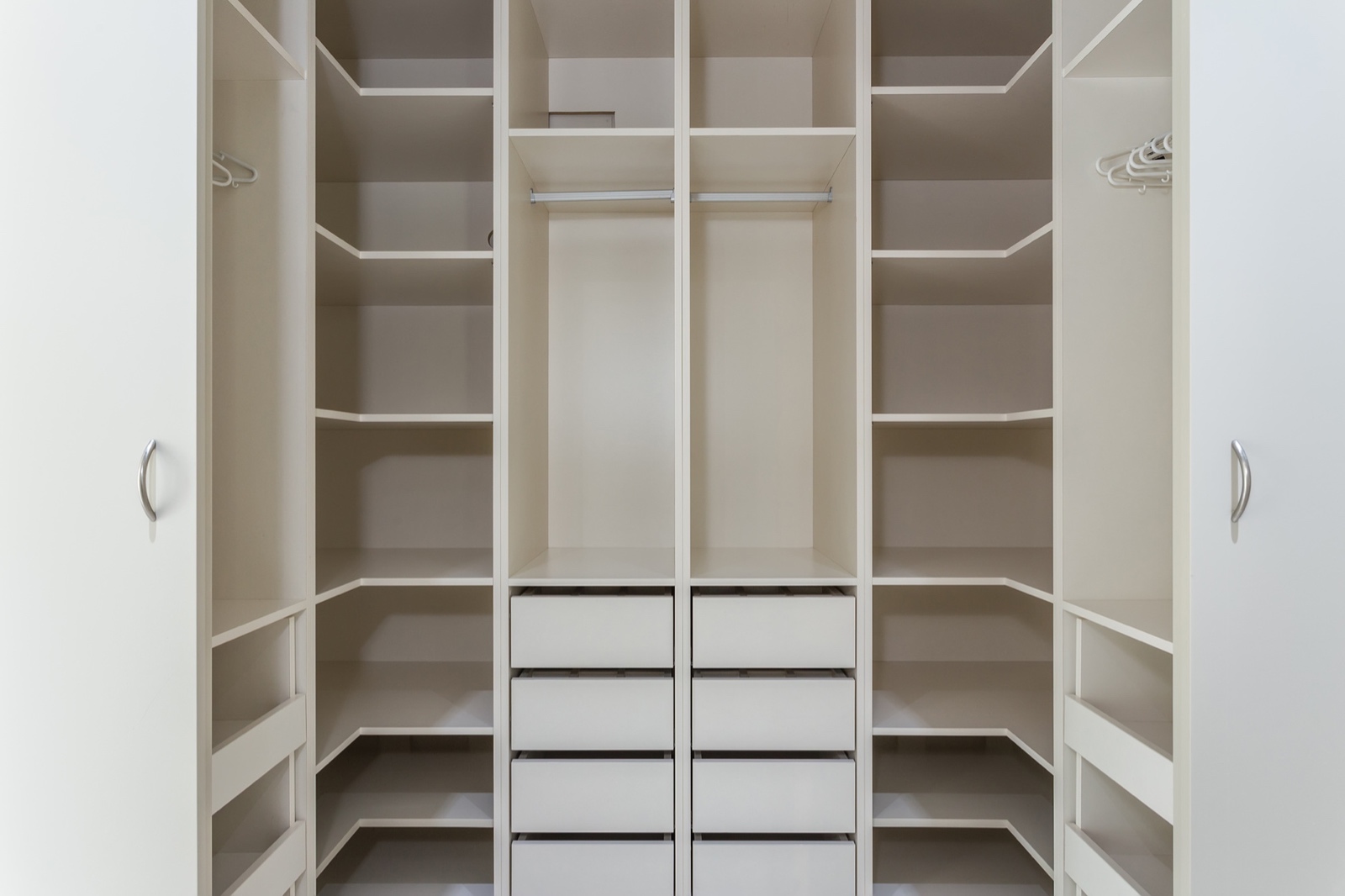 Modern closet in the hotel for different needs and clothes.